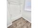 Bathroom boasting wood-look floors and a shower-tub combination with white walls at 4204 Labrador Dr, Raleigh, NC 27616