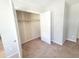 Bedroom closet with ample storage space, neutral carpet and walls at 4204 Labrador Dr, Raleigh, NC 27616