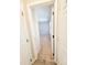 View of the bedroom entrance with neutral walls and carpeted flooring at 4204 Labrador Dr, Raleigh, NC 27616