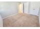 Bedroom with a neutral carpet, paint, and large closet at 4204 Labrador Dr, Raleigh, NC 27616