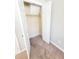 Carpeted closet with shelf and hanging rod at 4204 Labrador Dr, Raleigh, NC 27616