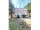 Charming two-story home with traditional architecture, manicured lawn and landscaped front yard with trees at 4204 Labrador Dr, Raleigh, NC 27616