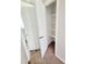 Open hallway closet offering ample shelving space at 4204 Labrador Dr, Raleigh, NC 27616