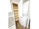 Open pantry and stackable washer/dryer for space-saving convenience in kitchen at 4204 Labrador Dr, Raleigh, NC 27616