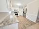 Stylish kitchen featuring granite countertops, stainless steel appliances, and ample storage for culinary enthusiasts at 4204 Labrador Dr, Raleigh, NC 27616