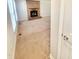 Inviting living room featuring a brick fireplace and plush carpet, ideal for cozy gatherings at 4204 Labrador Dr, Raleigh, NC 27616