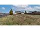 Expansive backyard featuring a privacy fence, lush greenery, and ample space for outdoor activities and relaxation at 47 London Ln, Angier, NC 27501