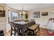 Traditional dining room with natural light and elegant table setting at 47 London Ln, Angier, NC 27501