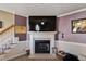 Living room featuring a fireplace with marble surround and decorative mantle at 47 London Ln, Angier, NC 27501