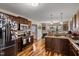 Kitchen features dark cabinets, stainless steel appliances, and hardwood floors at 47 London Ln, Angier, NC 27501