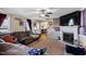 Inviting living room with fireplace, comfortable seating, and views into other rooms at 47 London Ln, Angier, NC 27501