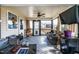 Relaxing screened porch features cozy furniture, ceiling fan, and outdoor views with plenty of room at 47 London Ln, Angier, NC 27501