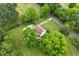 A high aerial view showcasing the property's location and lush surroundings at 524 N Occoneechee St, Hillsborough, NC 27278
