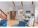 A bright and airy living space featuring hardwood floors and modern kitchen appliances at 524 N Occoneechee St, Hillsborough, NC 27278