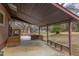 Covered back porch with deck, ideal for outdoor relaxation and entertainment, rain or shine at 524 N Occoneechee St, Hillsborough, NC 27278