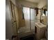 Cozy bathroom featuring a shower and vanity sink at 528 Mill St, Smithfield, NC 27577