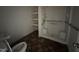 Clean bathroom with shower stall and built-in shelving at 528 Mill St, Smithfield, NC 27577