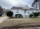 Charming home featuring a welcoming front porch and neatly trimmed landscaping at 528 Mill St, Smithfield, NC 27577