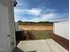 Secluded backyard space featuring a patio and landscaping, enclosed by a privacy fence at 605 Leland Hl Cir, Zebulon, NC 27597
