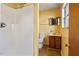 A full bathroom features a shower and vanity with tile flooring at 629 Martin St, Durham, NC 27704