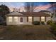 Charming single-story home featuring a well-maintained lawn and a cozy entrance, ready for new memories at 629 Martin St, Durham, NC 27704