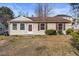 Charming single-story home with a cozy front porch and landscaped yard at 629 Martin St, Durham, NC 27704