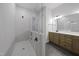 Beautiful bathroom boasting a large glass shower and vanity with ample storage at 63 Daybreak Way, Fuquay Varina, NC 27526