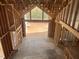 Living room featuring wooden frames and outdoor view at 63 Daybreak Way, Fuquay Varina, NC 27526