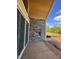 Outdoor patio featuring a stone fireplace, providing a relaxing entertaining space at 63 Daybreak Way, Fuquay Varina, NC 27526