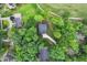 An aerial view of the house surrounded by trees and greenery in a lush neighborhood at 632 Angus Ct, Sanford, NC 27332