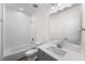 Bathroom featuring a shower/tub combo, subway tile, and a vanity with light green cabinets at 632 Angus Ct, Sanford, NC 27332