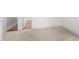 View of a bedroom's carpeted floor, base trim, and entry way at 632 Angus Ct, Sanford, NC 27332