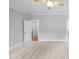Neutral bedroom boasts plush carpet, ceiling fan, and easy access to other areas of the house at 632 Angus Ct, Sanford, NC 27332