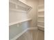Walk-in closet with adjustable shelving and ample storage space for organized living at 632 Angus Ct, Sanford, NC 27332