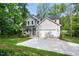 Charming two-story home with a well-manicured lawn, attached garage, and inviting curb appeal at 632 Angus Ct, Sanford, NC 27332