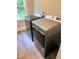 New Maytag washer and dryer set with energy-efficient features and quiet operation near window at 632 Angus Ct, Sanford, NC 27332