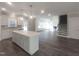 Spacious living room features an open floor plan and stairs to the second level at 632 Angus Ct, Sanford, NC 27332
