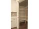 Walk-in pantry with shelving, conveniently located in the kitchen at 632 Angus Ct, Sanford, NC 27332