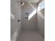 Walk-in shower featuring gray subway tile, rain shower head, and custom recessed shelf at 632 Angus Ct, Sanford, NC 27332