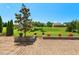 Beautiful backyard with a brick paver patio and a large grassy area, perfect for outdoor activities at 634 Conover Rd, Durham, NC 27703