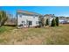 Spacious backyard with a patio area provides the perfect space for outdoor entertainment and enjoyment at 634 Conover Rd, Durham, NC 27703