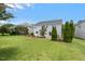 A beautiful backyard and patio area offer a tranquil outdoor space for relaxing and entertaining at 634 Conover Rd, Durham, NC 27703