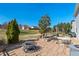 View of the backyard featuring a beautiful patio, perfect for outdoor entertaining and relaxing at 634 Conover Rd, Durham, NC 27703