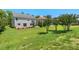 The house has a spacious lawn, an outdoor patio, and well-placed landscaping to create a lovely backyard space at 634 Conover Rd, Durham, NC 27703