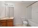 Functional bathroom featuring a vanity, toilet, mirror and combined shower and bathtub at 634 Conover Rd, Durham, NC 27703
