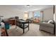 Versatile bonus room with natural light can be used as an office or recreational space at 634 Conover Rd, Durham, NC 27703