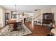 Elegant dining room with hardwood floors, open floor plan, and traditional furnishings at 634 Conover Rd, Durham, NC 27703