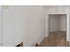 Hallway leading to closet with carpeted floors, ready for your personal touch at 634 Conover Rd, Durham, NC 27703