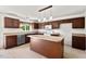 Well-equipped kitchen with stainless steel appliances, center island, and plenty of cabinet space at 634 Conover Rd, Durham, NC 27703