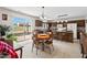 Bright eat-in kitchen featuring modern appliances, ample counter space, and seamless outdoor access at 634 Conover Rd, Durham, NC 27703